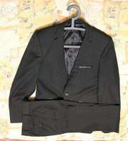 Продам мужской костюм (для юноши,  как новый)