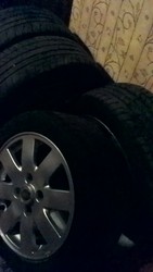 Срочно продам комплект литых дисков с ризиной.состояние идеальное!!!!!