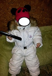 Детский пуховый комбинезон Moncler