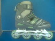  б/у роликовые  раздвижные  коньки